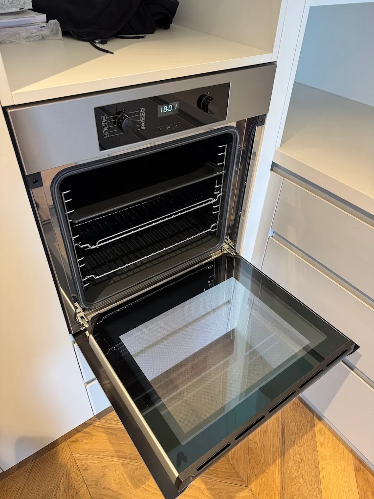 Inside of oven scrubbed and degreased during a deep clean